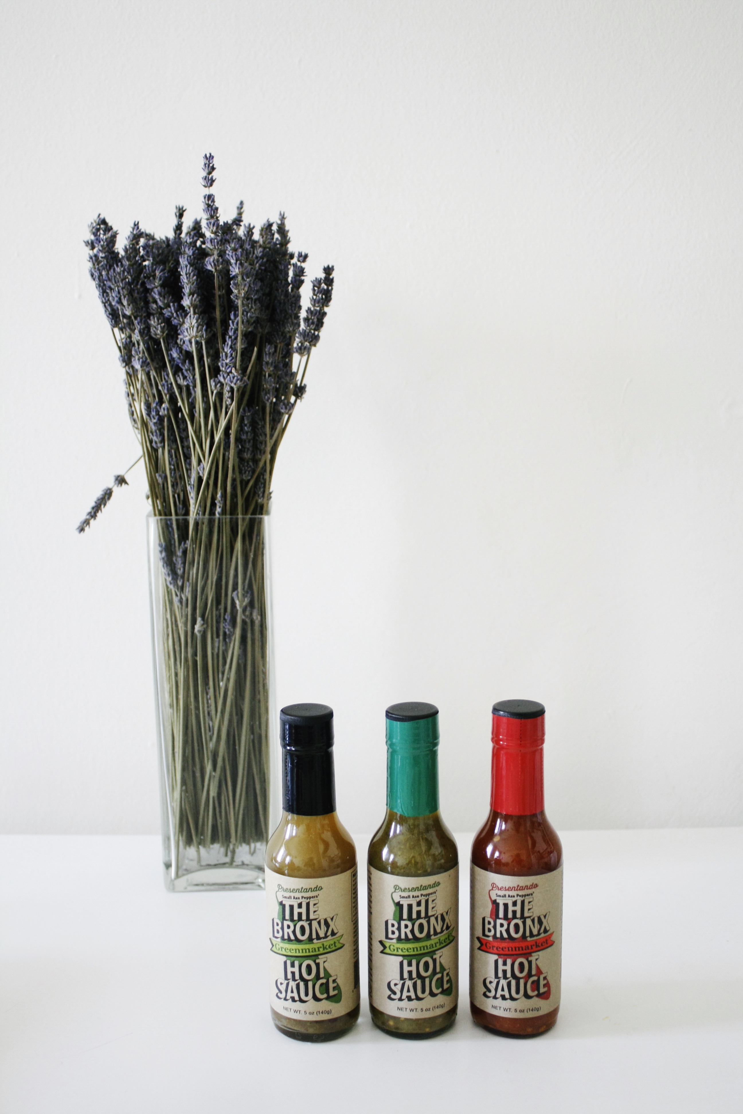 The Bronx Hot Sauce with lavender flowers 